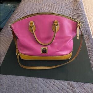 Dooney and Bourke beautiful pink roomy satchel. Very gently used